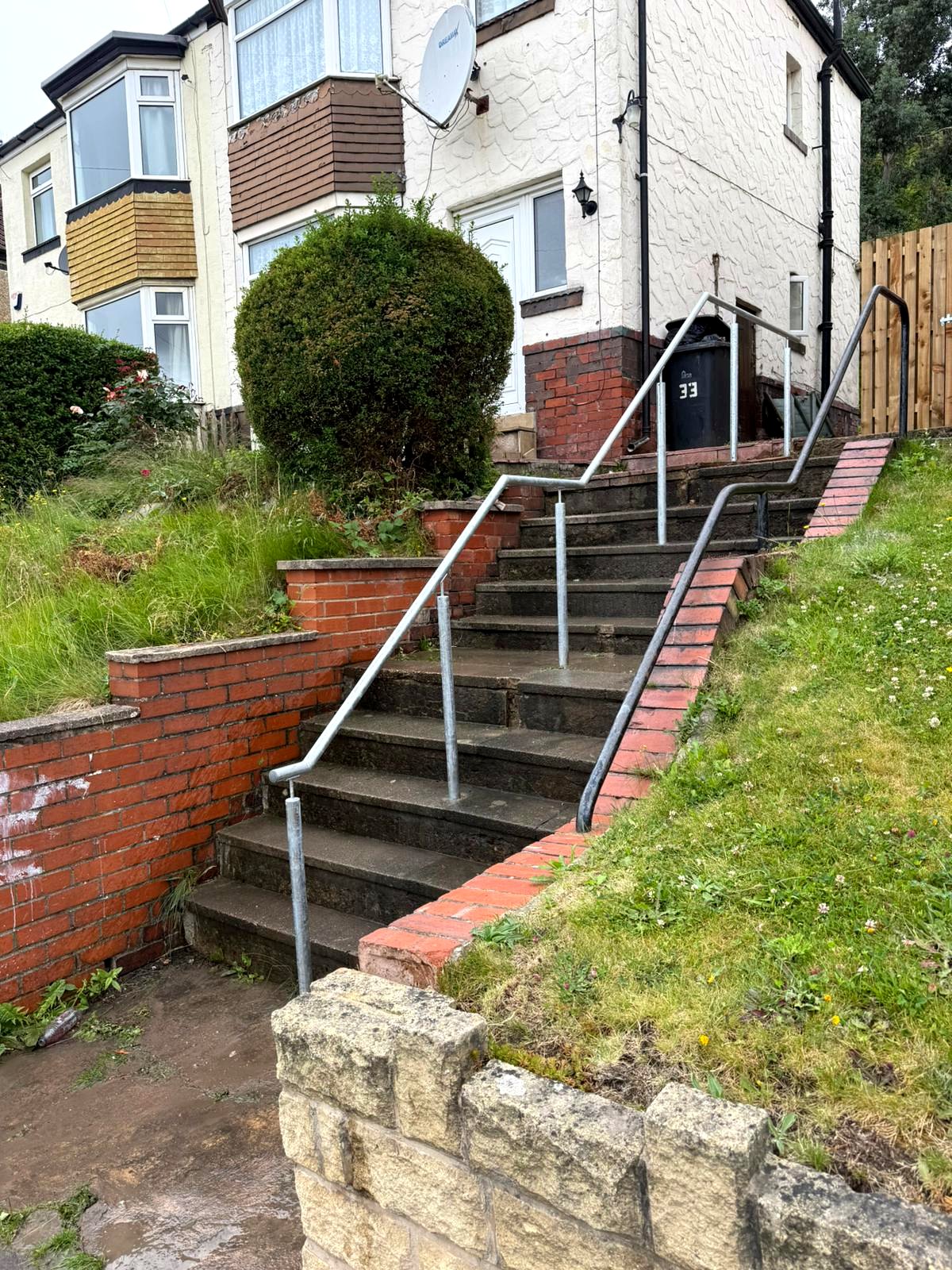 Galvanised steel handrail on posts up external steps, Sheffield